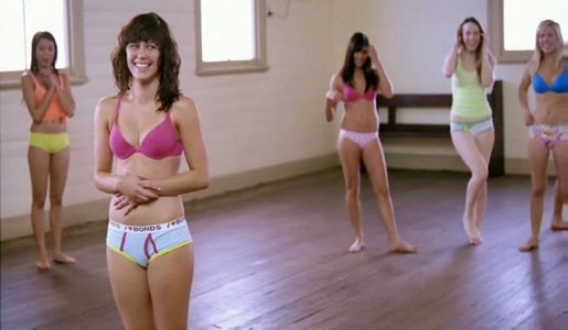 Dancers rest at the end of the Bonds Kaleidoscope ad