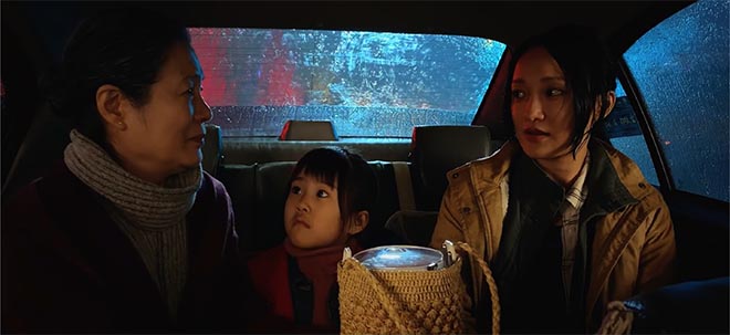 Family in back seat of taxi in Apple Daughter short film