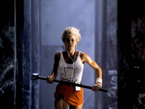 Women runs with hammer in Apple 1984 TV Ad