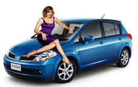 Kim and blue Nissan Tiida