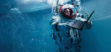 Diver and notebook in Lenovo Water Test