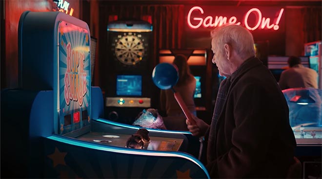 Bill Murray playing Whack a Mole in Jeep Groundhog Day commercial