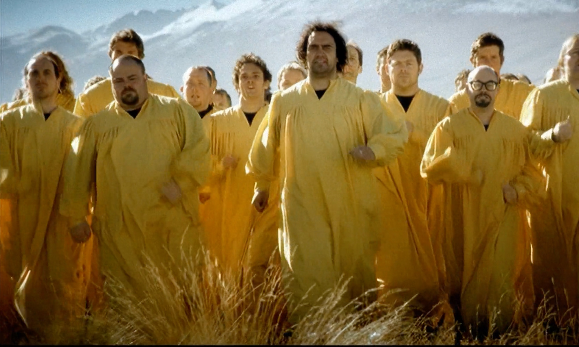 Carlton Draught Big Ad features many men in yellow kaftans